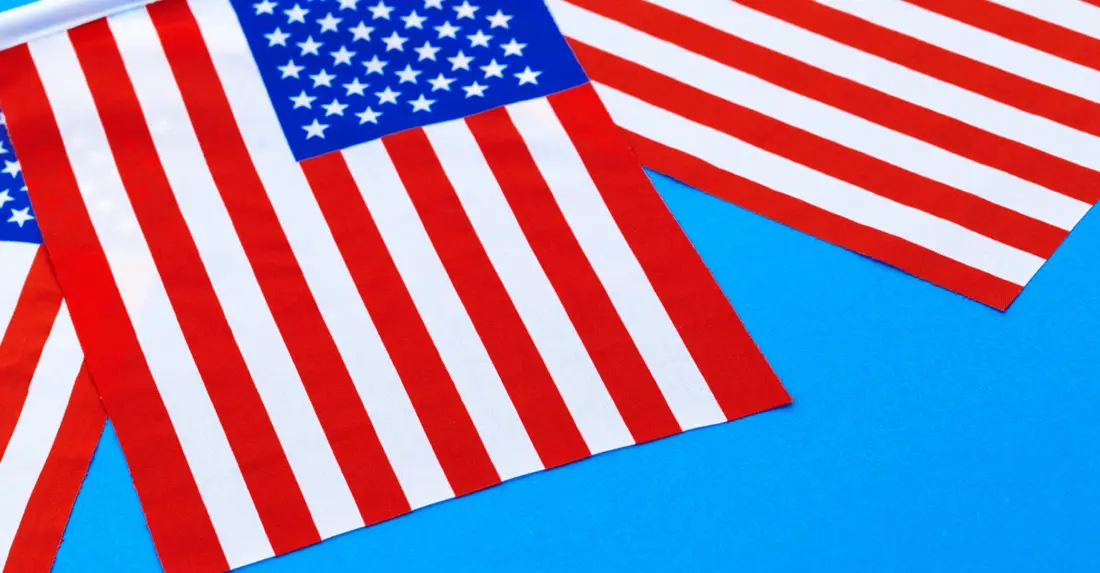 American flag over a fiberglass pool