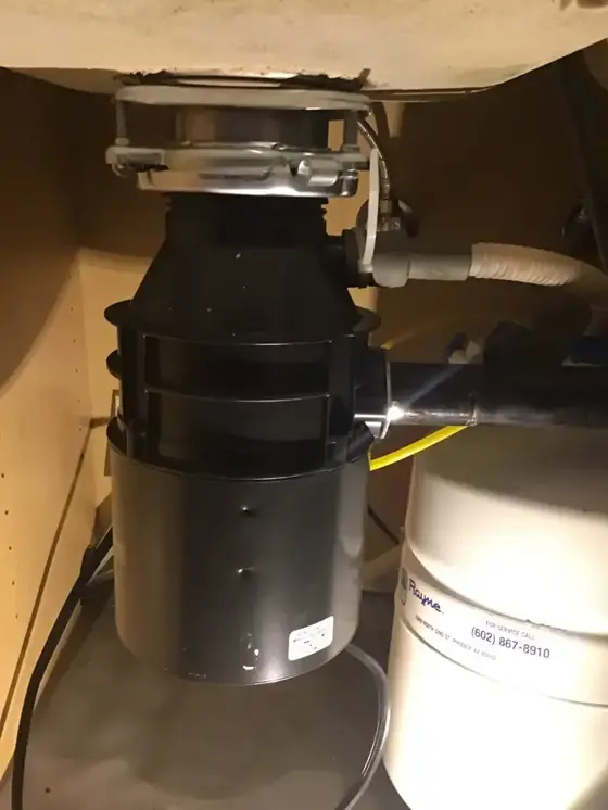 Garbage disposal installed under a sink
